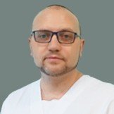Врач Шлыков Олег Алексеевич